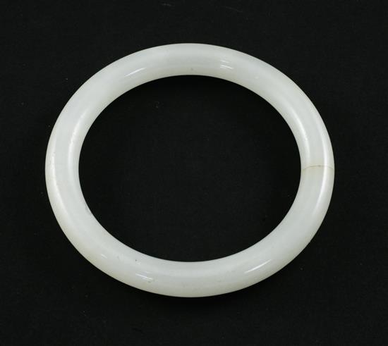 A Chinese white jadeite bangle, 9cm.